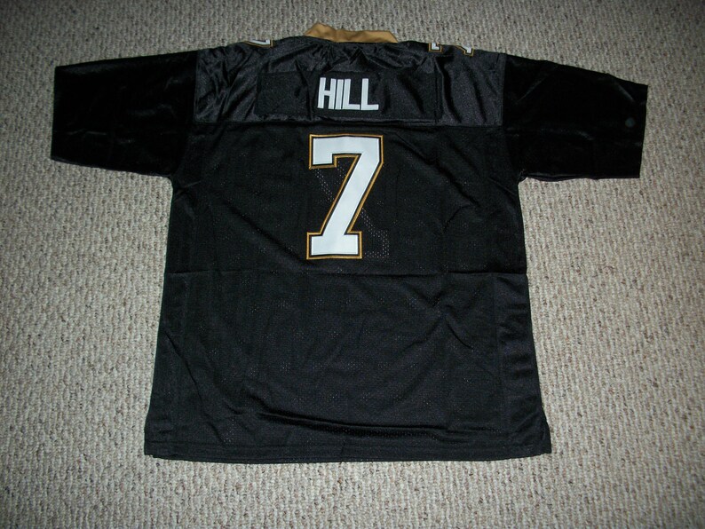 May include: Black football jersey with gold trim and the name "HILL" and number "7" on the back.