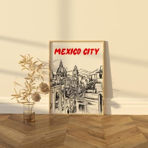 May include: A black and white line drawing of the Mexico City skyline with the text "MEXICO CITY" in red letters at the top of the image.