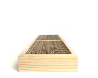 May include: A wooden scratching post for cats with a brown cardboard scratching surface.