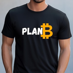 May include: A black t-shirt with the text "PLAN B" in white and a large orange Bitcoin symbol.