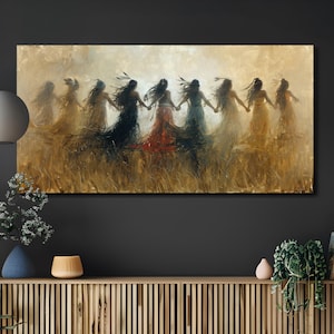 May include: An oil painting depicts a group of figures in flowing dresses holding hands in a field of tall grass. The figures are in shades of black, red, blue, and gold. The artwork has a warm, earthy color palette and a dreamlike quality.