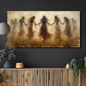 May include: An oil painting depicts a group of figures in flowing dresses holding hands in a circle. The figures are in shades of brown, beige, and red, set against a hazy, golden background. The artwork evokes a sense of movement and unity.