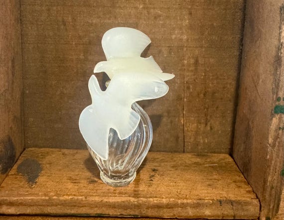 Nina Ricci "L'Air du Temps" perfume bottle.