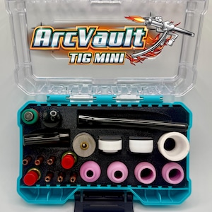 May include: A clear plastic storage case containing an ArcVault TIG MINI welding accessory kit. The kit includes various copper collets, red and black caps, a metal mesh filter, white and pink ceramic nozzles, and a long black welding torch component.