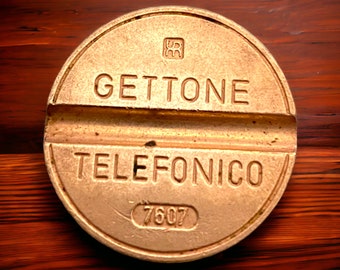 Viaje nostálgico: colección de fichas telefónicas antiguas - Número 7607, colección de fichas