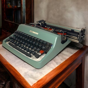 Máquina de escribir Olivetti carta 32, machian vintage, vintage, antiguo, coleccionable, objeto decorativo,