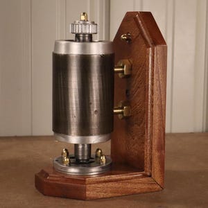 Industrial Strength Bookend - Upcycled Electric Motor Armature on Mahogany Base (Single Bookend)