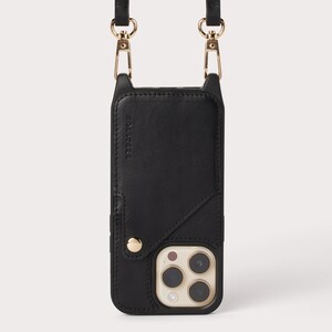 Estuche tipo cartera tipo bandolera de cuero genuino negro suave y ultraduradero para iPhone con bolsillo expandible para tarjetas y correa de hombro ajustable