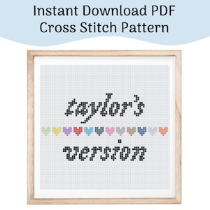 Op de afbeelding: Een ingelijst kruissteekpatroon met de woorden "taylor's version" in zwarte blokletters. Het ontwerp bevat een rij kleurrijke harten en de tekst "Instant Download PDF Cross Stitch Pattern".