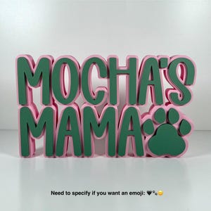 May include: Pink and green wooden sign with the text "MOCHA'S MAMA" and a green paw print.