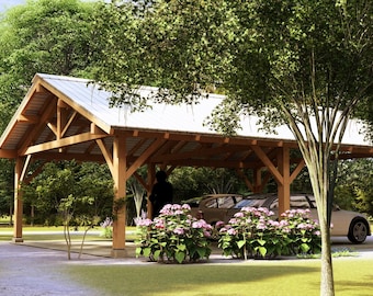May include: A wooden carport with a white metal roof, sheltering two cars. The structure is surrounded by lush greenery, including trees and flowering plants. The design is open and airy, with a natural aesthetic.