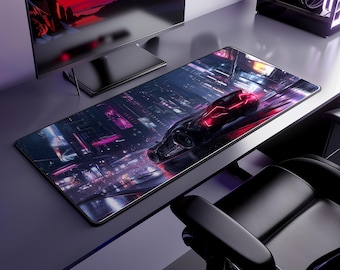 May include: A rectangular desk mat featuring a dark, futuristic cityscape graphic with neon purple and red lighting accents. A sleek, dark sports car with glowing red headlights and taillights is positioned centrally on the mat surface.