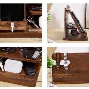 May include: A wooden organiser with multiple compartments for storing various items, including a phone, watch, glasses, and keys. The organiser has a dark brown finish and a rustic look.