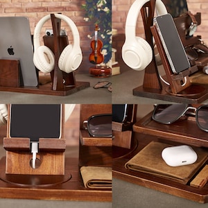 May include: A wooden organizer with multiple compartments for storing various items, including a phone, headphones, glasses, and a watch. The organizer has a brown finish and is made of wood.