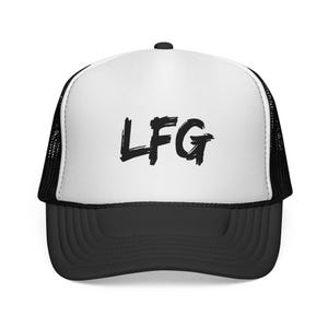 May include: A black and white trucker hat with the letters "LFG" in a bold, black font across the front. The hat has a white front panel, a black brim, and a black mesh back.
