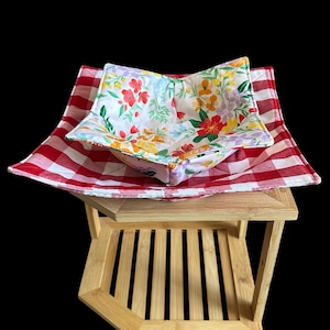 May include: A trio of ceramic mugs with a speckled, matte finish in cream, light grey, and dark grey. Each mug features a simple, minimalist design, ideal for tea or coffee.