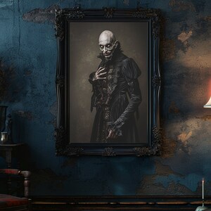 May include: A framed portrait of a man in a dark, gothic-style outfit, with pale skin and a sinister expression. The portrait is set against a dark background and is framed in a black ornate frame. The portrait is hanging on a blue wall with a distressed texture.