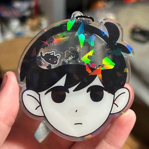 Charm agitador de espacio blanco OMORI