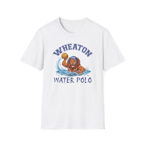 May include: A white short-sleeve t-shirt featuring a graphic of a lion wearing a blue water polo cap with the text LYONS, holding a yellow ball in water. The text WHEATON is arched above the lion, and WATER POLO is printed below the graphic.