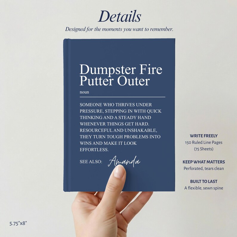 May include: A navy blue notebook with white text reading Dumpster Fire Putter Outer, a definition of the noun, and the name Amanda. The notebook features 150 ruled pages, 75 sheets, a flexible sewn spine, and measures 5.75 inches by 8 inches.