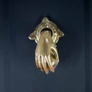 Exquisite door knockers, not just practical but also perfect for home adornment. Crafted with precision, they add a touch of elegance, making them ideal gifts for loved ones.