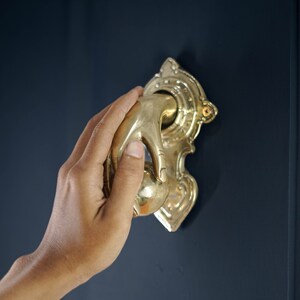 Exquisite door knockers, not just practical but also perfect for home adornment. Crafted with precision, they add a touch of elegance, making them ideal gifts for loved ones.