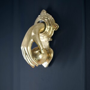 Exquisite door knockers, not just practical but also perfect for home adornment. Crafted with precision, they add a touch of elegance, making them ideal gifts for loved ones.