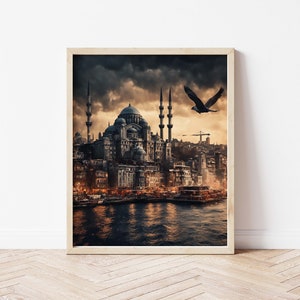 May include: A framed photograph of a mosque with minarets in a city setting. The mosque is lit up with warm light, and there are boats in the water in front of it. A bird flies overhead against a dark, cloudy sky.