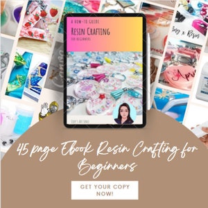May include: A digital tablet displaying a 45-page ebook titled "Resin Crafting for Beginners." The ebook cover features a colorful collage of resin crafts, including keychains, coasters, and jewelry. The text "Get Your Copy Now!" is displayed below the tablet.