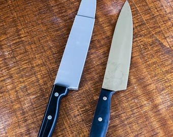 Faca de chef retrátil com mola (adereço de filme)