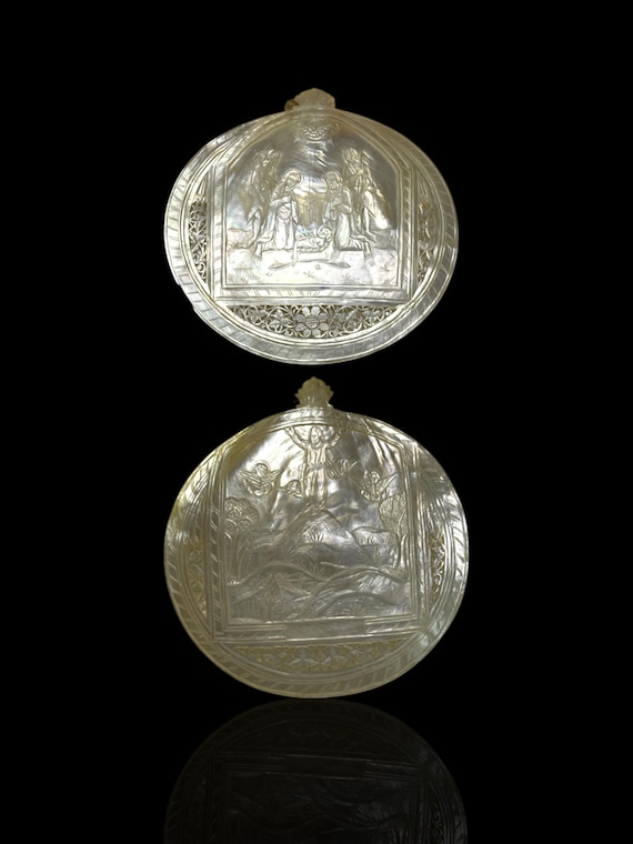 A typical mother-of-pearl carving from Bethlehem featuring a nativity scene.