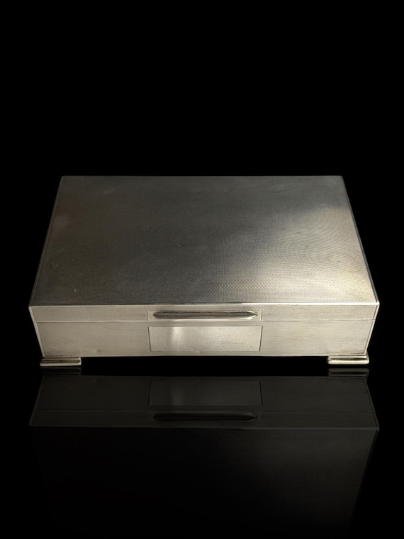 Sterling silver tobacco box. Dated 1965. SJ Rose and Son, England.