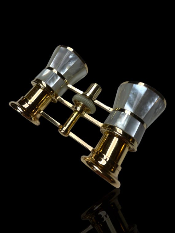 A mint condition gilt Mignon mother of pearl binocular opera glasses. Circa 1950 - 1970.