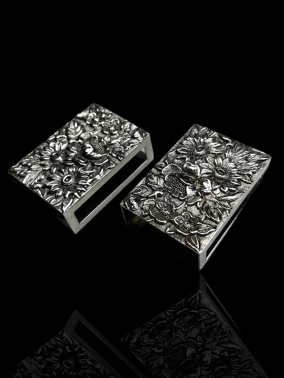 A vintage pair of sterling silver match box holders by American silversmith S Kirk & Sons.
