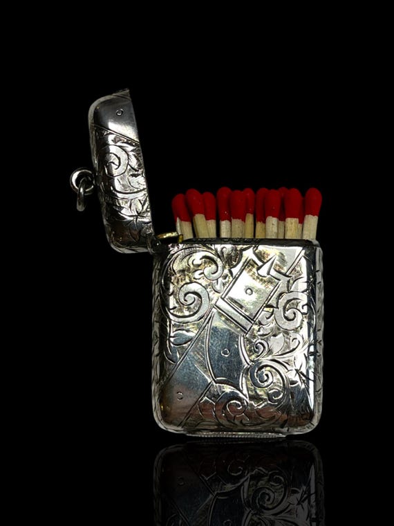 A sterling silver vesta (match stick case). Made in 1896. England.