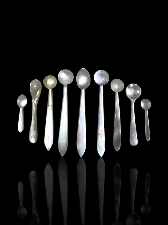 A fine collection of 19th century mother of pearl condiment spoons.