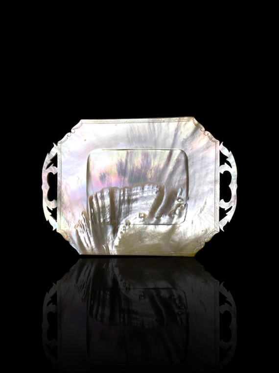 A large antique mother of pearl serving plate. Circa 1900.