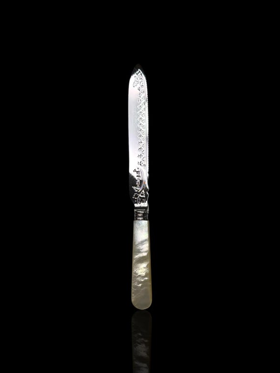 Large Bread Knife: 1904, Sterling Silver and Mother of Pearl. Hammond, Creake and Co.