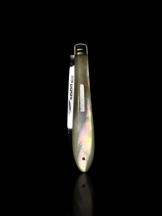 An Antique Victorian Era Mother of Pearl Folding Knife – Hallmarked Sterling Silver. By Hilliard & Thomason. England.