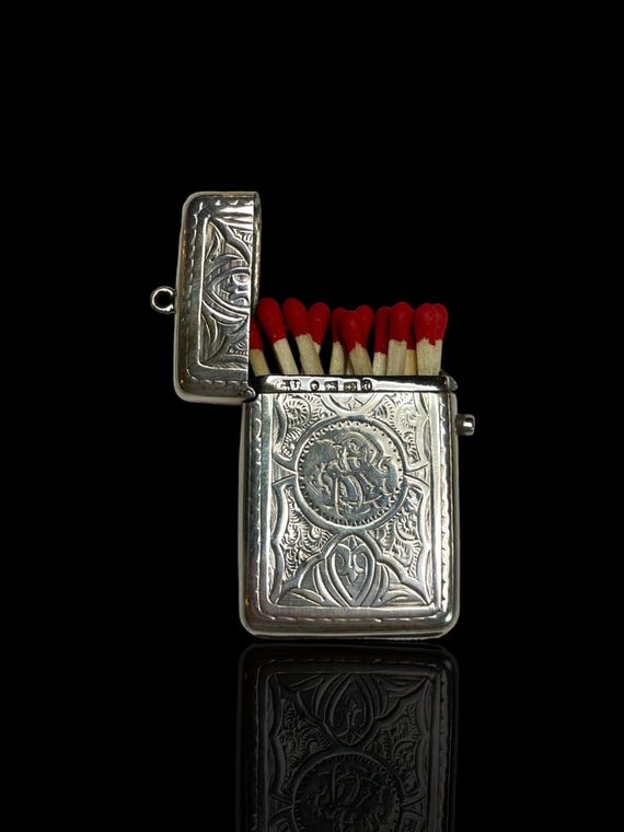 A fine quality sterling silver vesta (match stick holder. Made in 1880 by George Unite. England.