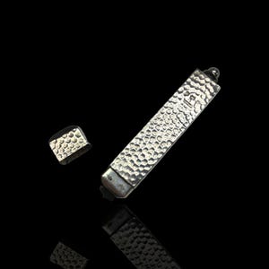 A rare and unusual sterling silver lighter. Dated 1908 by English Silversmith G.V. & Company.