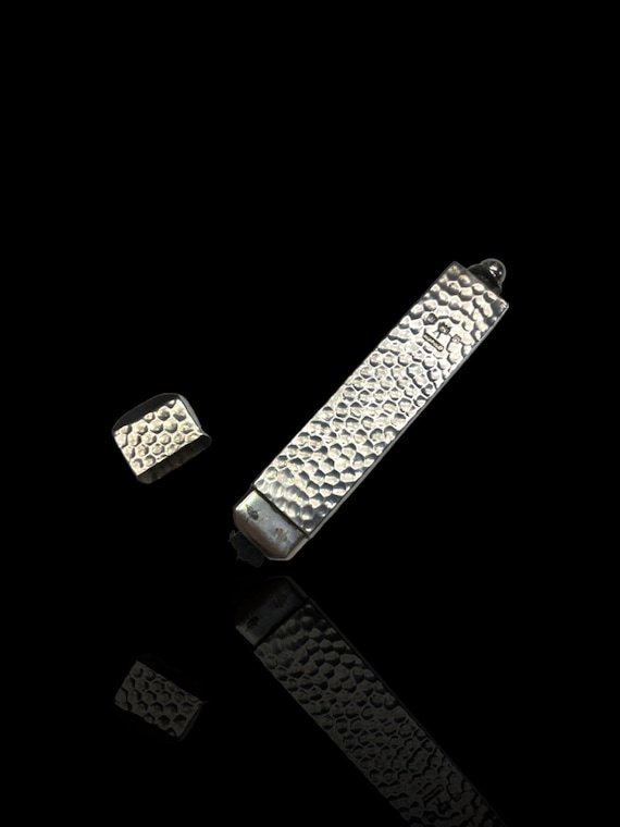 A rare and unusual sterling silver lighter. Dated 1908 by English Silversmith G.V. & Company.
