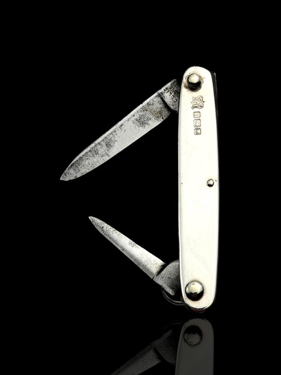 Antique Knife. 1909. Sterling Silver and Stainless Steel.