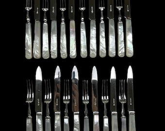 A rare and complete 24 piece set of sterling silver and mother of pearl cutlery by Martin Hall & Co.  Made in 1926 - 1927.