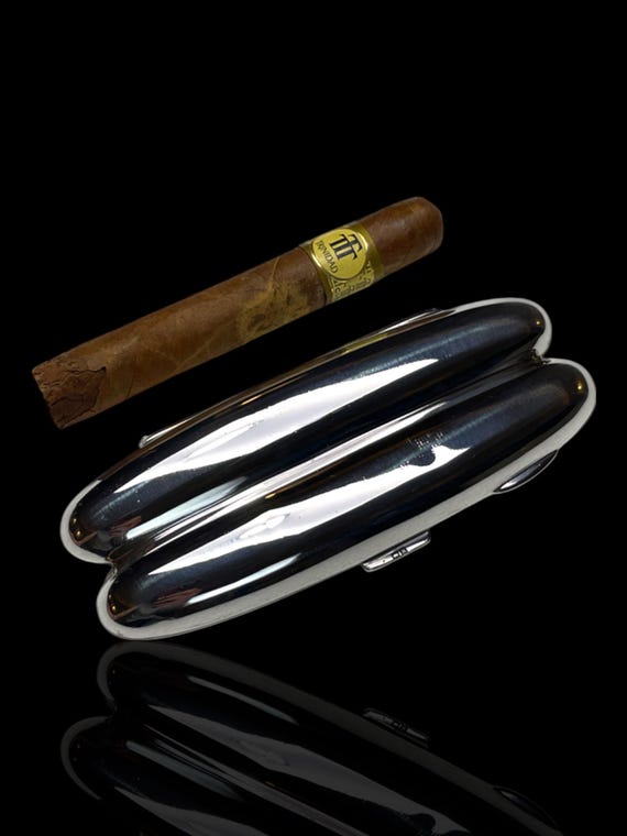 A fine sterling silver double cigar case. Made in 1900 in Chester, England by Silversmith John Millward Banks