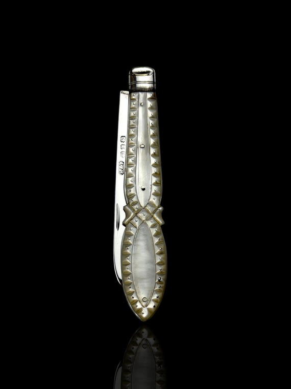 Antique Pocket Knife. 1891, Mother of Pearl and Sterling Silver.