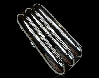 Sterling Silver Triple Cigar Case: 1886, George Neil & George Clekenwell, London.