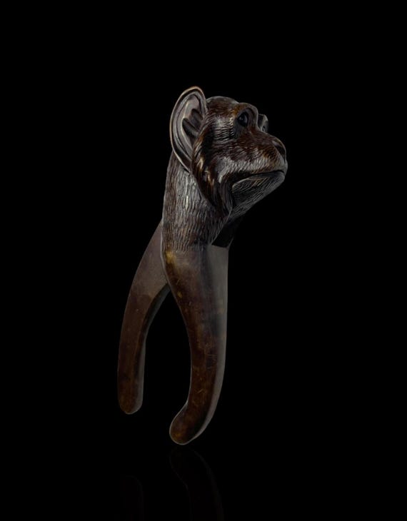 A fine and rare hand-carved German Black Forest Nutcracker. Circa 1900.