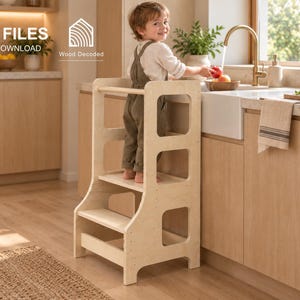 May include: A light-colored wooden learning tower with two steps and side railings. The text CNC FILES DIGITAL DOWNLOAD and Wood Decoded are visible, along with icons for DXF, SVG, STP, and IGS file formats. The structure is made of plywood.