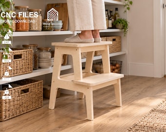 May include: A light-coloured wooden two-step stool with a flat top and a lower step. The text CNC FILES DIGITAL DOWNLOAD and Wood Decoded are visible, along with icons for DXF, SVG, STP, and IGS file formats. The stool has a simple, functional design.